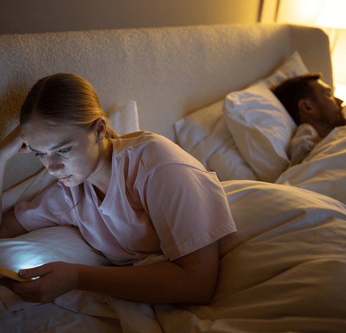 Couple in bed Emotional Disconnection in Relationships